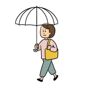 ビニール傘をさす女性